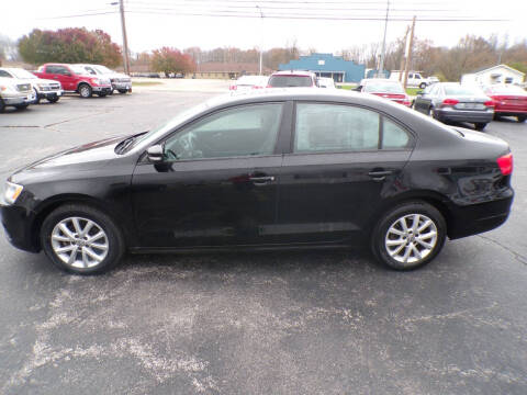 2012 Volkswagen Jetta for sale at R V Used Cars LLC in Georgetown OH