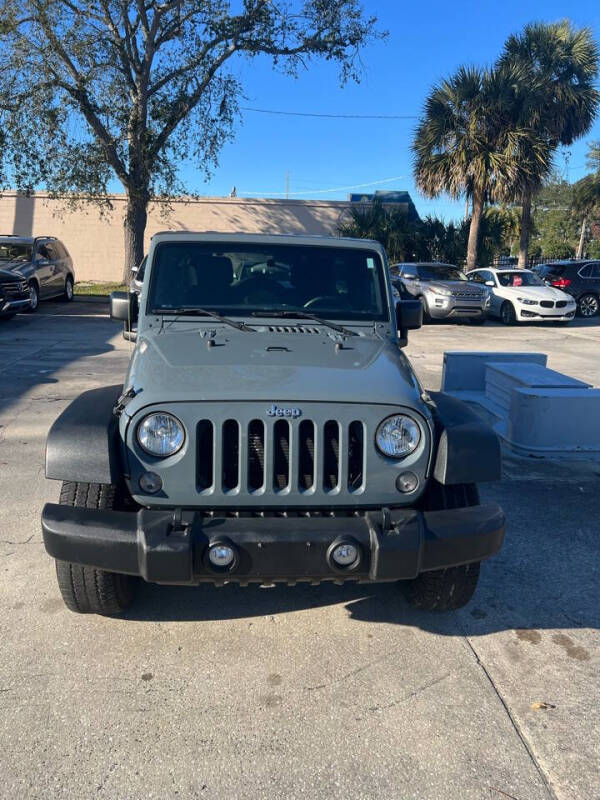 2015 Jeep Wrangler Unlimited for sale at DM Auto Sales in Daytona Beach FL