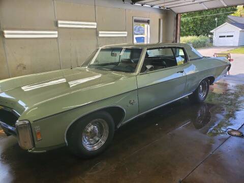1969 Chevrolet Impala for sale at MADDEN MOTORS INC in Peru IN