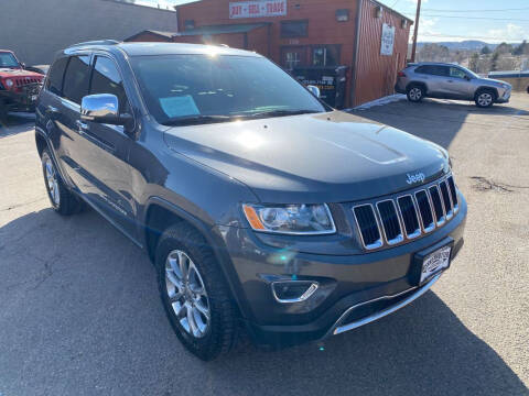 2015 Jeep Grand Cherokee for sale at BERKENKOTTER MOTORS in Brighton CO