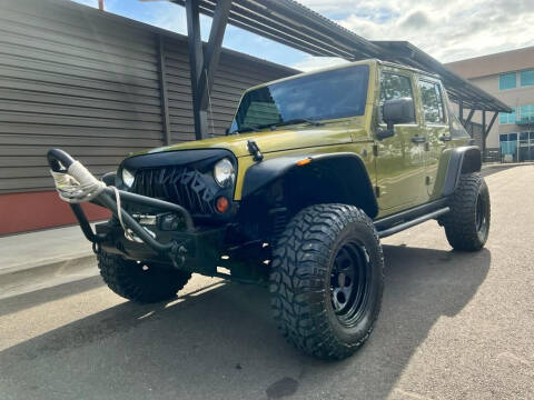 2010 Jeep Wrangler Unlimited for sale at VIking Auto Sales LLC in Salem OR