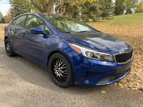 2018 Kia Forte for sale at BELOW BOOK AUTO SALES in Idaho Falls ID
