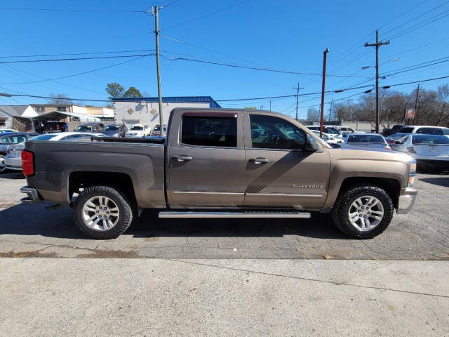 2014 Chevrolet Silverado 1500 for sale at DAGO'S AUTO SALES LLC in Dalton, GA