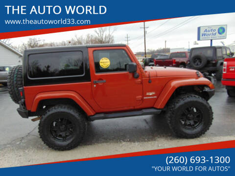 2009 Jeep Wrangler for sale at THE AUTO WORLD in Churubusco IN