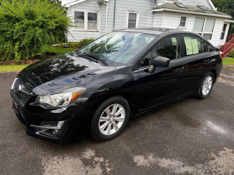 2015 Subaru Impreza for sale at Warren Auto Sales in Oxford NY