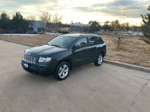 2014 Jeep Compass for sale at QUEST MOTORS in Englewood CO