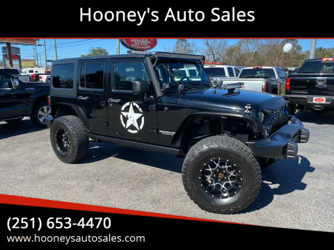 2014 Jeep Wrangler Unlimited for sale at Hooney's Auto Sales in Theodore AL