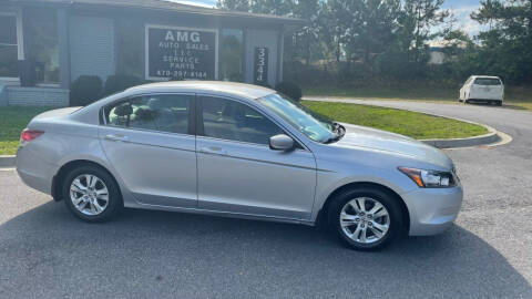 2009 Honda Accord for sale at AMG Automotive Group in Cumming GA