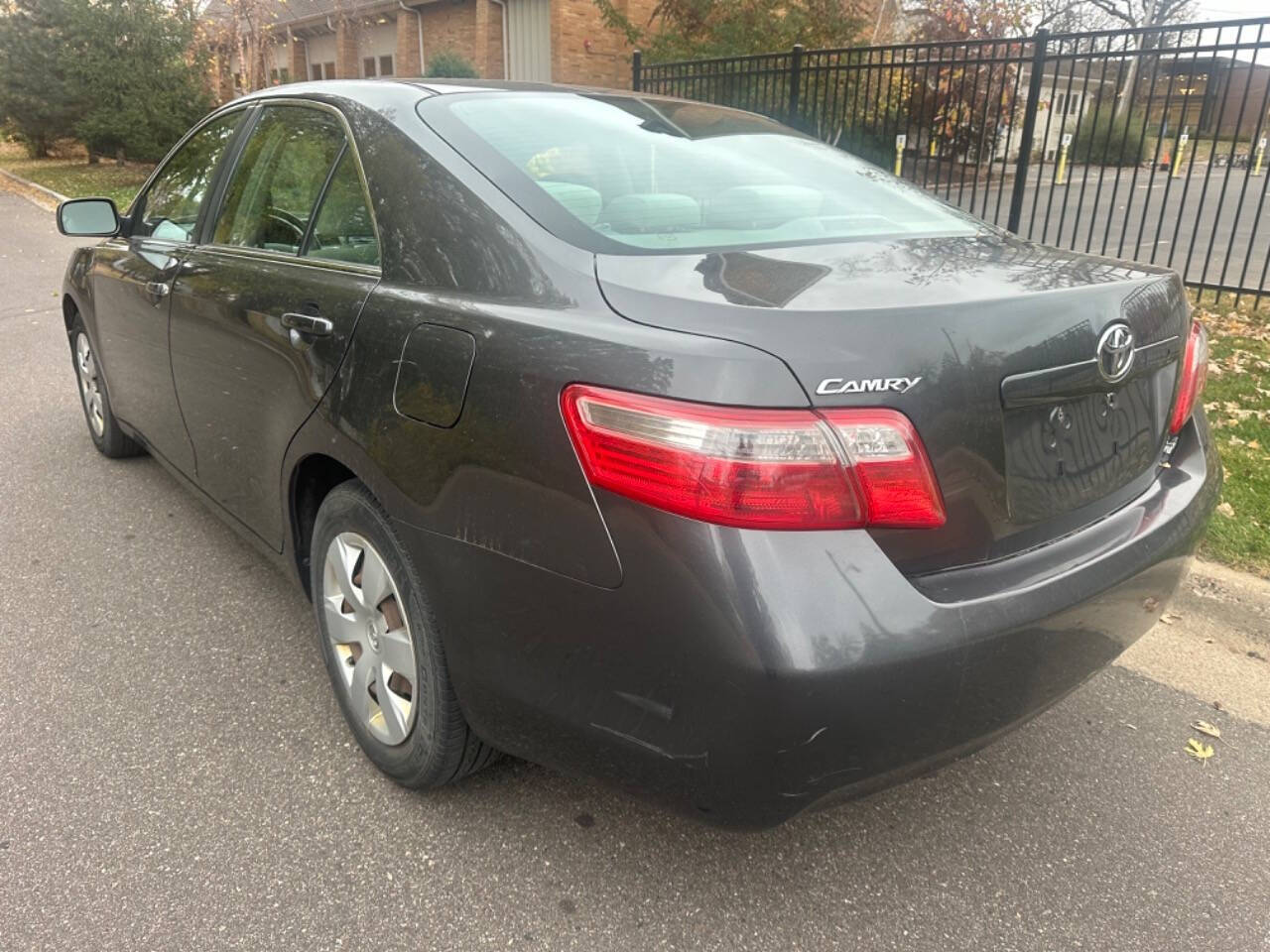 2008 Toyota Camry for sale at JUST AUTOS in MINNEAPOLIS, MN