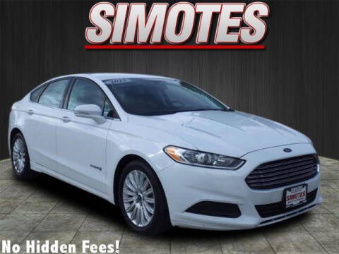 2015 Ford Fusion Hybrid for sale at SIMOTES MOTORS in Minooka IL