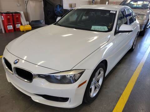 2013 BMW 3 Series for sale at THE SHOWROOM in Miami FL