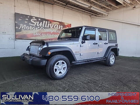 2013 Jeep Wrangler Unlimited for sale at SULLIVAN MOTOR COMPANY INC. in Mesa AZ
