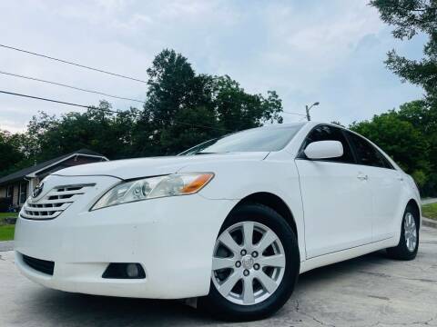 2009 Toyota Camry for sale at Cobb Luxury Cars in Marietta GA