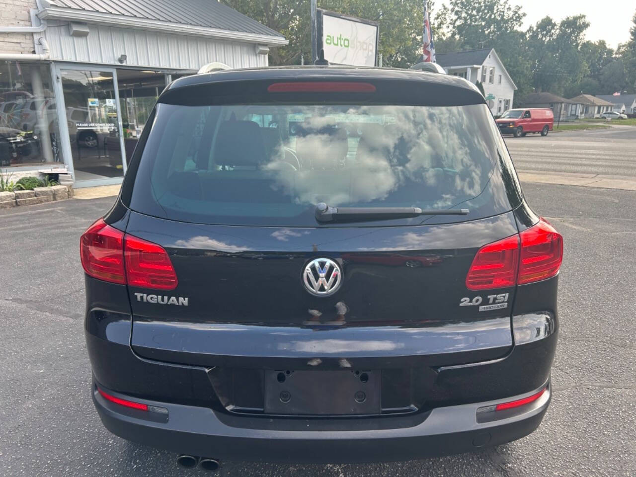 2013 Volkswagen Tiguan for sale at Auto Shop in Wyoming, MI