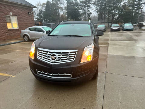 2016 Cadillac SRX for sale at Decisive Auto Sales in Shelby Township MI