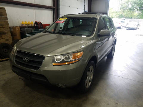 2009 Hyundai Santa Fe for sale at Hometown Automotive Service & Sales in Holliston MA