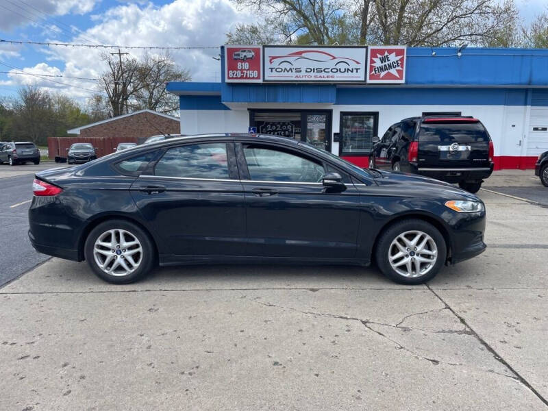 2016 Chrysler 300 for sale at Tom's Discount Auto Sales in Flint MI