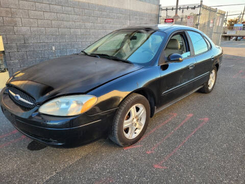 2002 Ford Taurus for sale at Autos Under 5000 + JR Transporting in Island Park NY