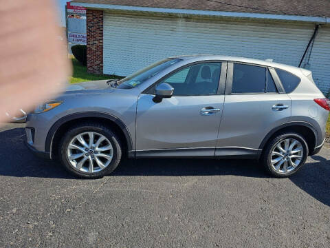 2014 Mazda CX-5 for sale at CRYSTAL MOTORS SALES in Rome NY
