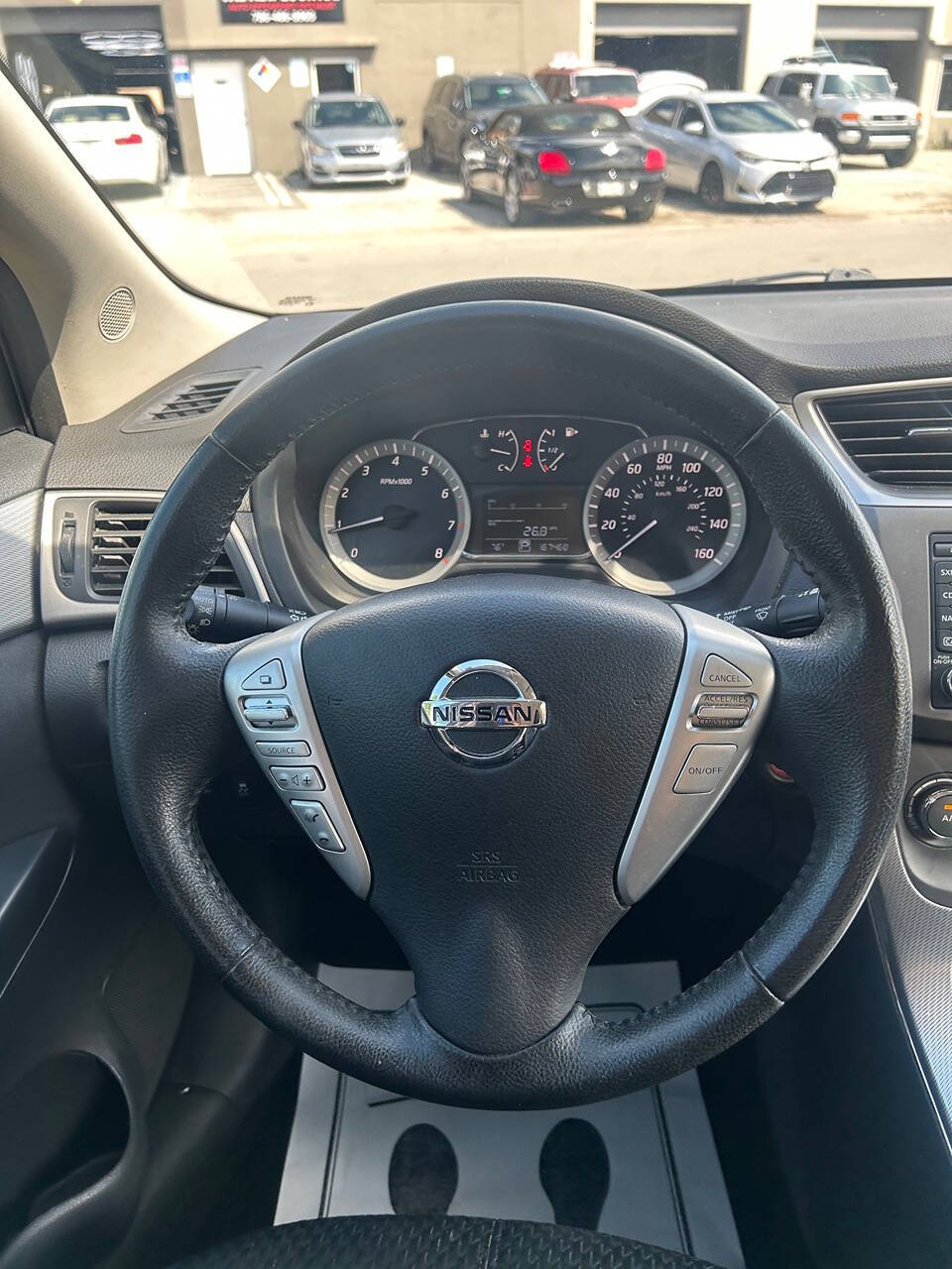 2014 Nissan Sentra for sale at ALPHA AUTOMOTIVE SALES in Oakland Park, FL