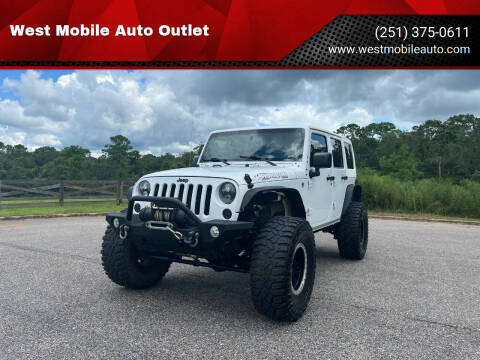 2014 Jeep Wrangler Unlimited for sale at West Mobile Auto Outlet in Mobile AL