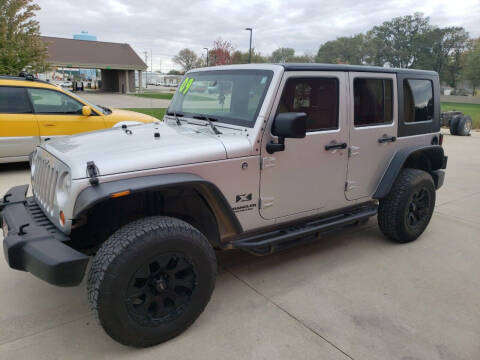 2009 Jeep Wrangler Unlimited for sale at LEROY'S AUTO SALES & SVC in Fort Dodge IA