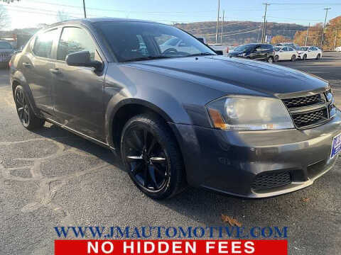 2014 Dodge Avenger for sale at J & M Automotive in Naugatuck CT