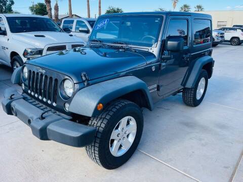 2014 Jeep Wrangler for sale at A AND A AUTO SALES in Gadsden AZ