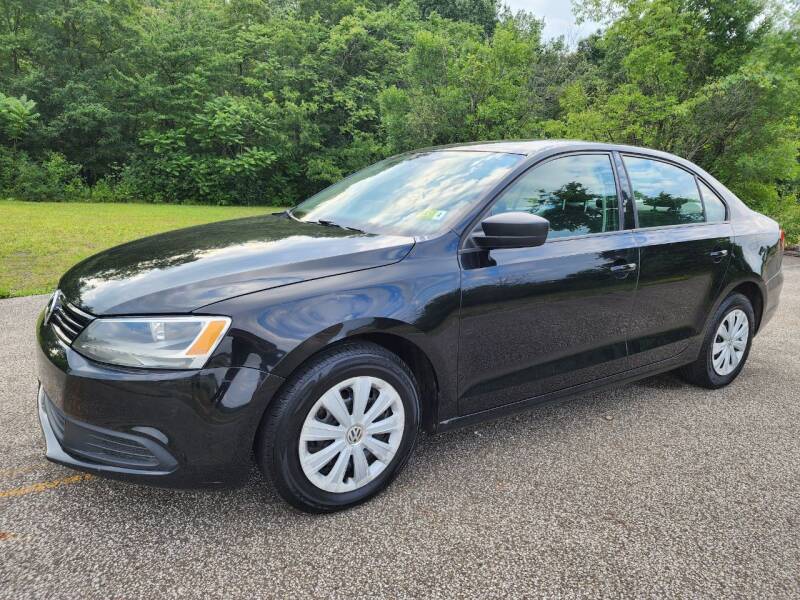 2013 Volkswagen Jetta for sale at Akron Auto Center in Akron OH
