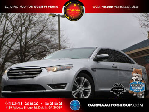 2016 Ford Taurus for sale at Carma Auto Group in Duluth GA