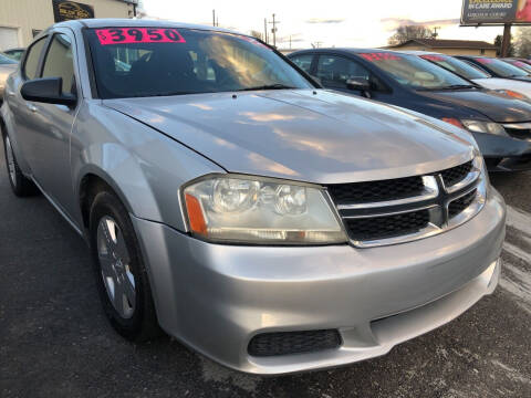 2011 Dodge Avenger for sale at BELOW BOOK AUTO SALES in Idaho Falls ID