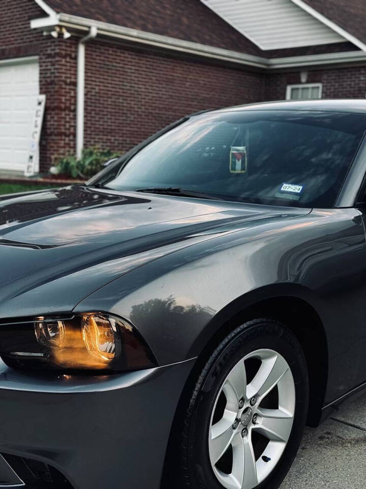 2014 Dodge Charger for sale at Akl Motor LLC in Vance, AL