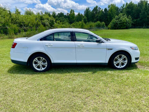 2016 Ford Taurus for sale at Poole Automotive in Laurinburg NC