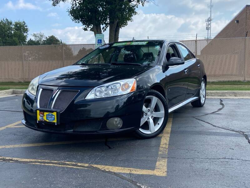 2009 Pontiac G6 for sale at ACTION AUTO GROUP LLC in Roselle IL
