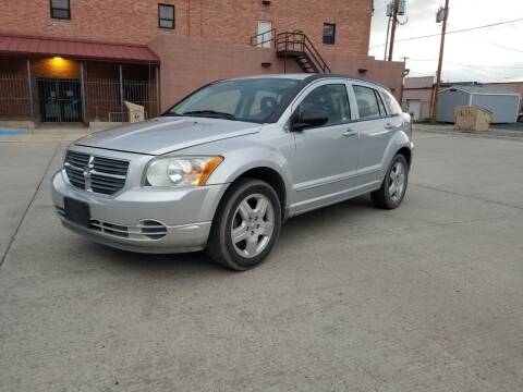2009 Dodge Caliber for sale at KHAN'S AUTO LLC in Worland WY