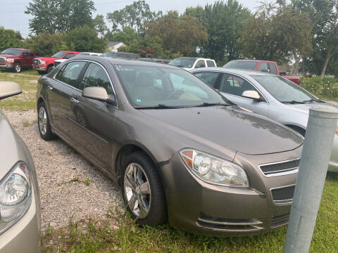 2011 Chevrolet Malibu for sale at HEDGES USED CARS in Carleton MI