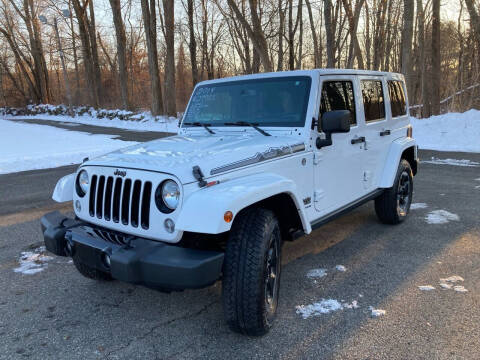 2014 Jeep Wrangler Unlimited for sale at Lou Rivers Used Cars in Palmer MA