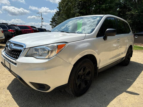 2014 Subaru Forester for sale at Northwoods Auto & Truck Sales in Machesney Park IL