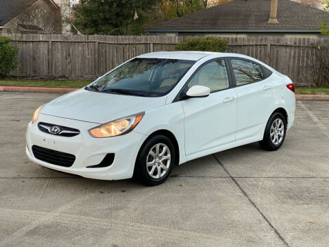 2014 Hyundai Accent for sale at KM Motors LLC in Houston TX
