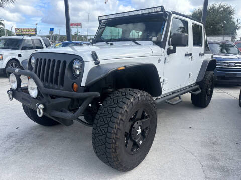 2013 Jeep Wrangler Unlimited for sale at American Auto Brokers in West Palm Beach FL