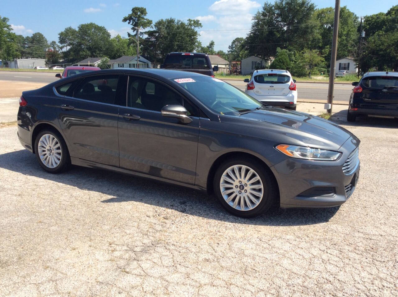 2016 Ford Fusion Hybrid for sale at SPRINGTIME MOTORS in Huntsville, TX