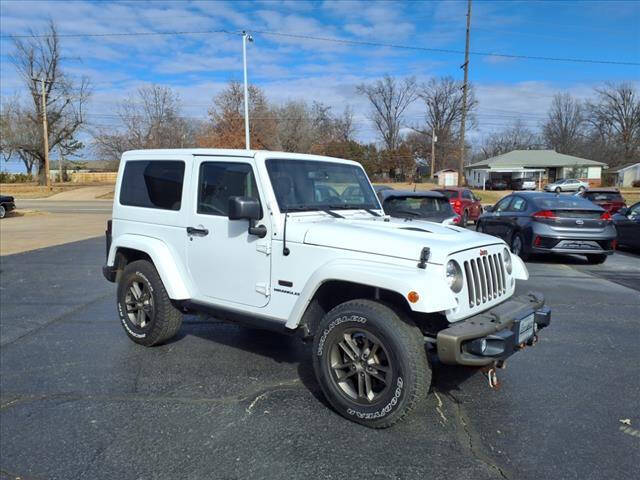 2016 Jeep Wrangler for sale at HOWERTON'S AUTO SALES in Stillwater OK