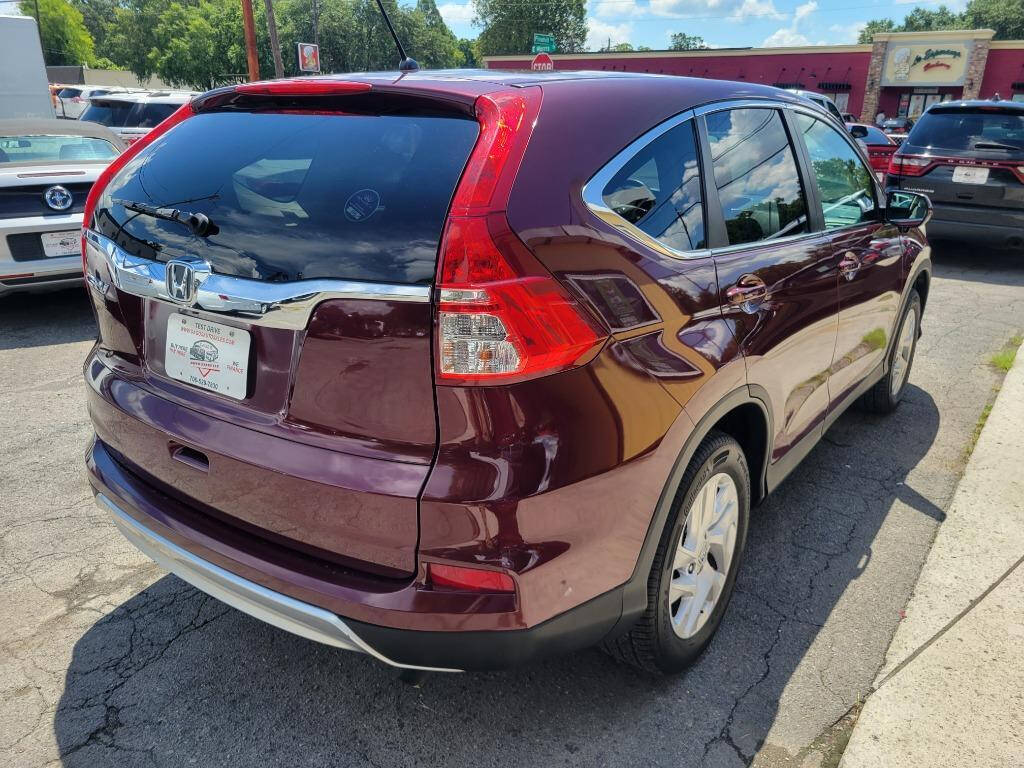 2016 Honda CR-V for sale at DAGO'S AUTO SALES LLC in Dalton, GA