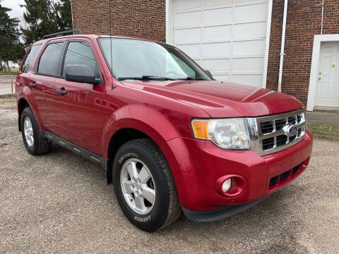 2010 Ford Escape for sale at Jim's Hometown Auto Sales LLC in Byesville OH