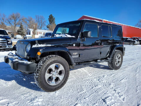 2017 Jeep Wrangler Unlimited for sale at A & B Auto Sales in Ekalaka MT