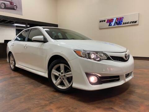 2013 Toyota Camry for sale at Driveline LLC in Jacksonville FL