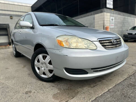 2006 Toyota Corolla for sale at Illinois Auto Sales in Paterson NJ