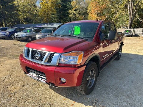 2014 Nissan Titan for sale at Northwoods Auto & Truck Sales in Machesney Park IL