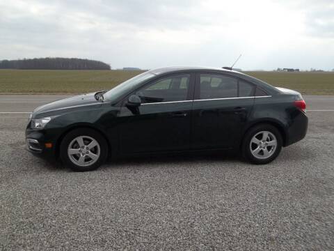 2015 Chevrolet Cruze for sale at Howe's Auto Sales in Grelton OH