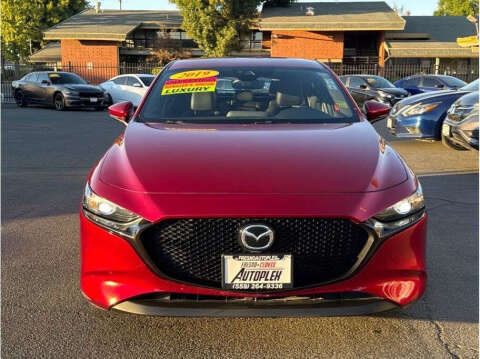 2019 Mazda Mazda3 Hatchback for sale at Armando Auto Sales in Fresno CA